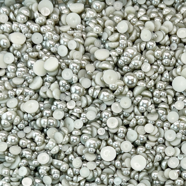 A close-up view of oyster gray flat-back acrylic pearls embellishment mix.